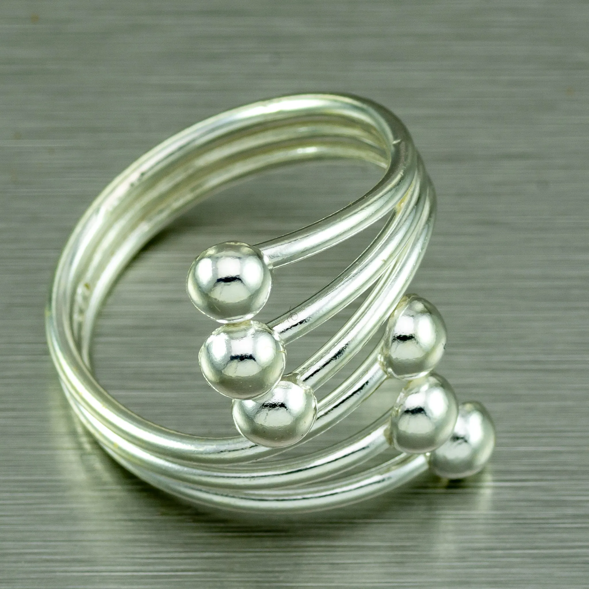 Modern, sterling silver multi ball ring